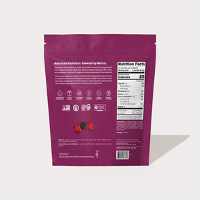 Back of a purple product package labeled Berry Pomegranate with nutrition facts and product information.