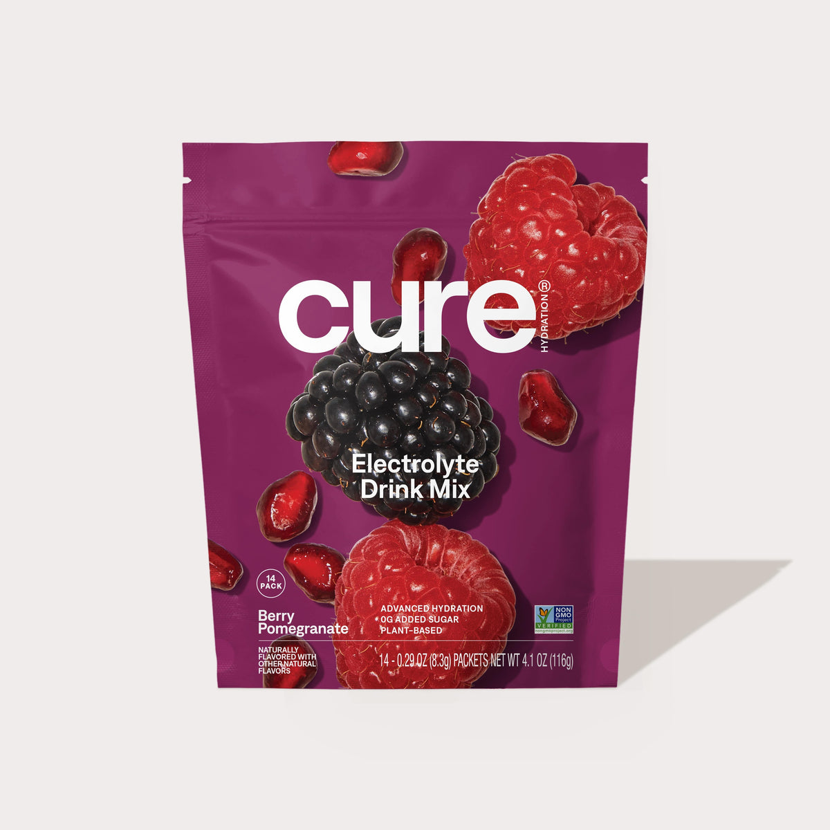 Cure Electrolyte Drink Mix packet with images of blackberries, raspberries, and pomegranate seeds on a purple background